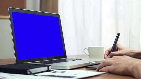 Male hands using a digital drawing tablet and a laptop computer at home Stock Footage 81879015