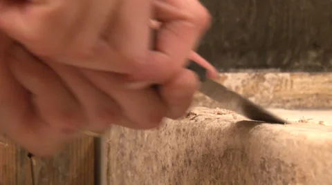 Male hands using putty knive to clean debris from surface Stock-Footage 39911463