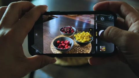 Male Hands using smartphone taking photos berry. Closeup. 4K. Stock Footage 197374939