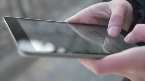 Male Hands using a tablet computer, texting, typing, message concept, outdoor 60 Video stock 87088473