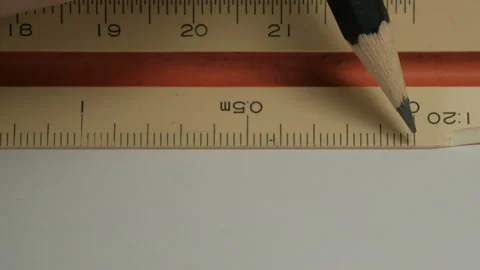 Male hands using a triangular scale ruler. Stock Footage 134360273