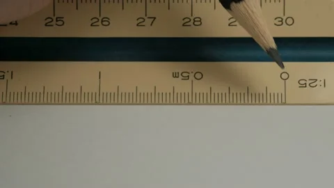 Male hands using a triangular scale ruler. Stock Footage 134360300