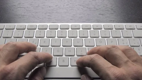 Male hands write on a white keyboard Stock-Footage 119694476