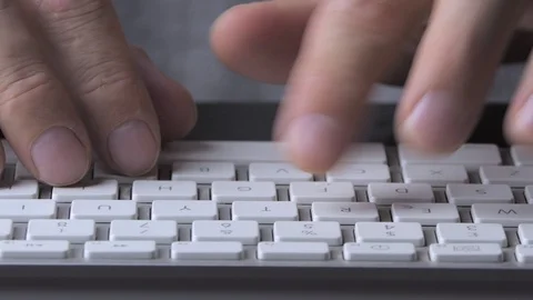 Male hands write on a white keyboard Video stock 119694515