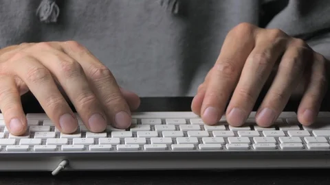 Male hands write on a white keyboard Stock-Footage 119694577