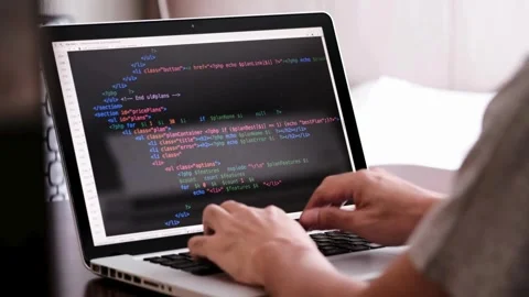 Male hands writing program codes on his computer screen close-up. programmers Stock-Footage 334585916
