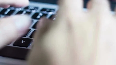 Male hands writing program codes on his computer screen close-up. programmers Stock-Footage 334586171