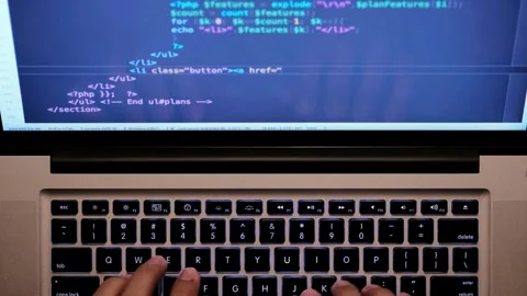 Male hands writing program codes on his computer screen close-up. programmers 스톡 동영상 334586281