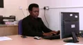 Male at his desk arguing on the phone HD Footage