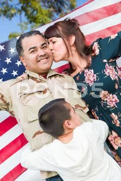 Male Hispanic Armed Forces Soldier Celebrating His Return Holding American Fl Stock Photos