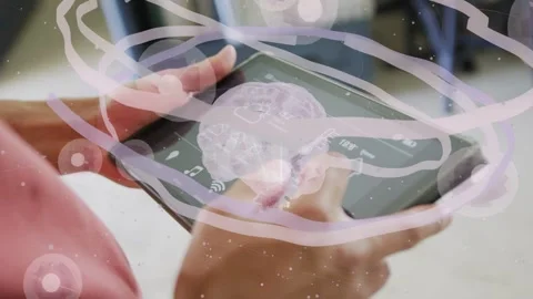 Male holding tablet, tapping lower screen and dragging to rotate 3D medical Stock Footage 337579229