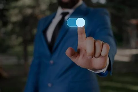 Male human presenting a presentation using the latest sophisticated device... Stock Photos