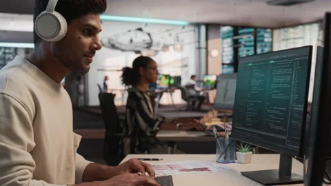 Male Indian Programmer Coding In Game Development Office Stock Footage 255795305