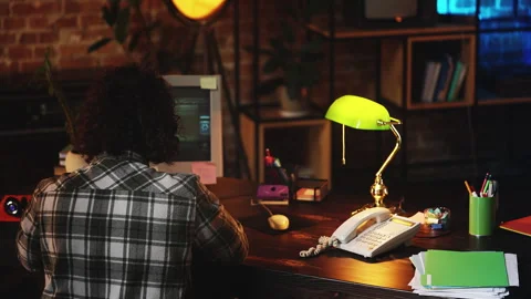Male IT developer working with programming code on retro computer, 90s lifestyle Stock Footage 321084596