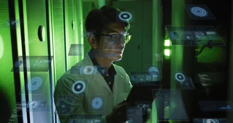 Male IT engineer using tablet in server row, holograms over racks highlighting Stock Footage 331214002