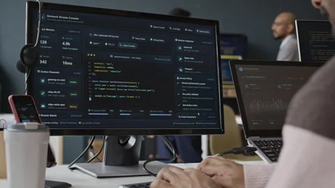 Male IT Professional Coding Software on Computer in Office Stock Footage 337484182