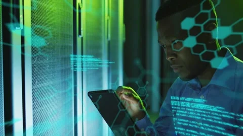 Male IT tech tapping tablet in data center, diagnosing servers with hex UI Stock Footage 332566578