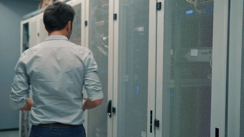 Male It Technician Engineer With Tablet Work In Server Room Data Center Vídeo Stock 103213822