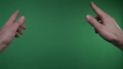 Male left hand with index finger point on green screen background. Alpha channel Stock Footage