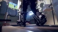 Male Legs Attached To Robotized Suit. Stock Footage