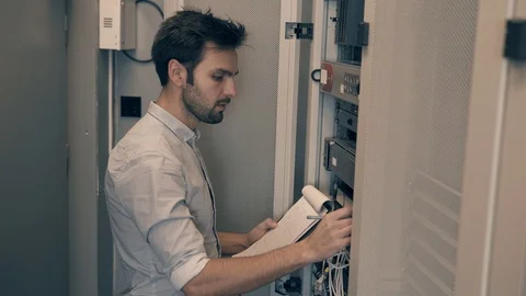 Male Man Server IT Engineer Work In Data Center. 動画素材 104178105