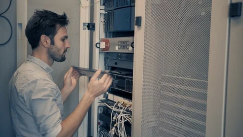 Male Man Server IT Engineer Work In Data Center. 動画素材 104178241