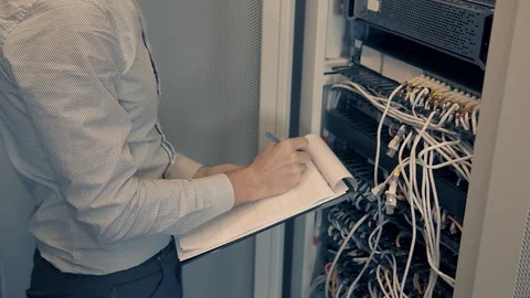 Male Man Server IT Engineer Work In Data Center. 库存影片 104199174