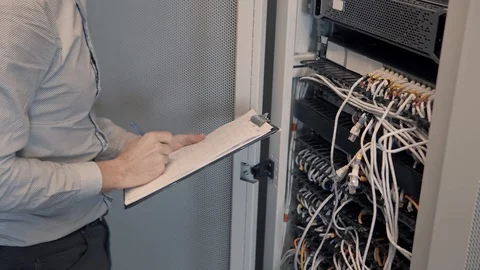 Male Man Server IT Engineer Work In Data Center. 库存影片 104199189