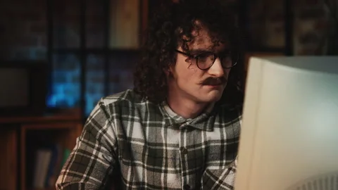 Male manager in eyeglasses having computer problems, 90s lifestyle workplace Stock-Footage 321072641
