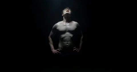Male Model After Training Exercising As Smoke Falls On Him Sweaty Stock Footage 113889034