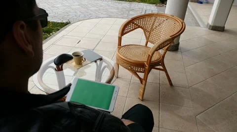 Male Model In Dark Jacket Looking At Ipad - Tablet Technology Internet Search Stock Footage 49044377