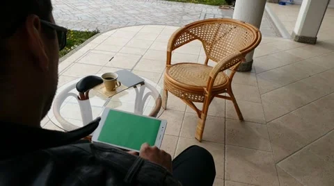 Male Model In Dark Jacket Looking At Ipad - Tablet Technology Internet Search Stock Footage 49044709