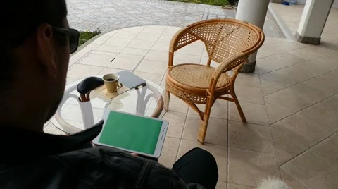 Male Model In Dark Jacket Looking At Ipad - Tablet Technology Internet Search Stock Footage 49044745