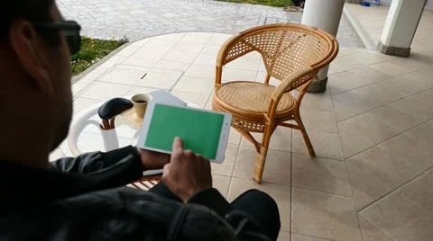 Male Model In Dark Jacket Looking At Ipad - Tablet Technology Internet Search Stock Footage 49045042