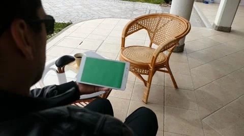 Male Model In Dark Jacket Looking At Ipad - Tablet Technology Internet Search Stock Footage 49045046