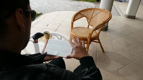 Male Model In Dark Jacket Looking At Ipad - Tablet Technology Internet Search Stock Footage 49045441