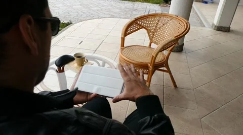 Male Model In Dark Jacket Looking At Ipad - Tablet Technology Internet Search Stock Footage 49045671