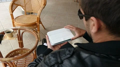 Male Model In Dark Jacket Looking At Ipad - Tablet Technology Internet Search Stock Footage 49045909
