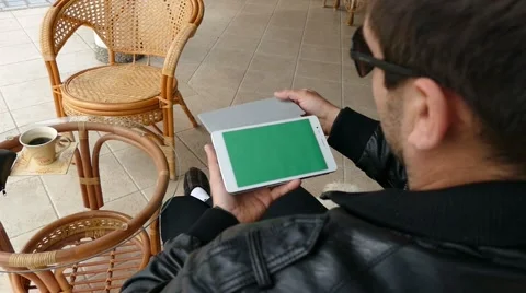 Male Model In Dark Jacket Looking At Ipad - Tablet Technology Internet Search Stock Footage 49064117
