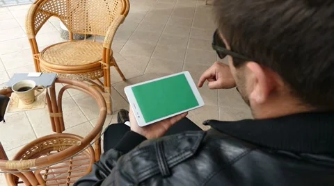 Male Model In Dark Jacket Looking At Ipad - Tablet Technology Internet Search Stock Footage 49065247