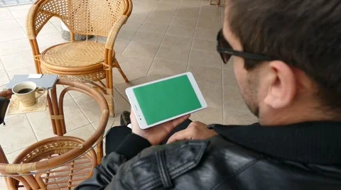 Male Model In Dark Jacket Looking At Ipad - Tablet Technology Internet Search Stock Footage 49065751