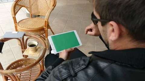 Male Model In Dark Jacket Looking At Ipad - Tablet Technology Internet Search Stock Footage 49066026