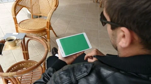 Male Model In Dark Jacket Looking At Ipad - Tablet Technology Internet Search Stock Footage 49066061