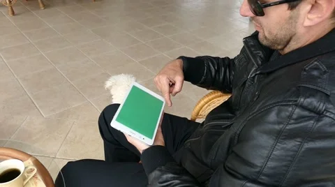 Male Model In Dark Jacket Looking At Ipad - Tablet Technology Internet Search Stock Footage 49066283