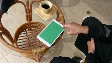 Male Model In Dark Jacket Looking At Ipad - Tablet Technology Internet Search Stock Footage 49144432