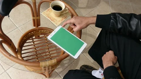 Male Model In Dark Jacket Looking At Ipad - Tablet Technology Internet Search Stock Footage 49146861