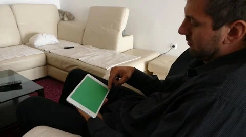 Male Model In Dark Jacket Looking At Ipad - Tablet Technology Internet Search Stock Footage 49148331