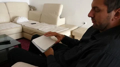 Male Model In Dark Jacket Looking At Ipad - Tablet Technology Internet Search Stock Footage 49183725