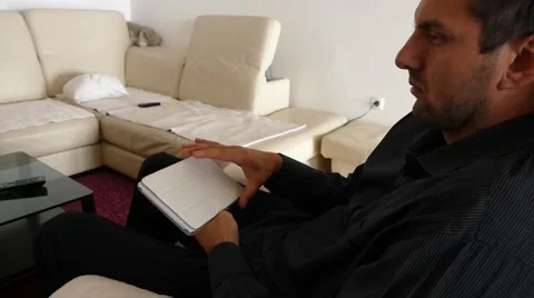 Male Model In Dark Jacket Looking At Ipad - Tablet Technology Internet Search Stock Footage 49183803