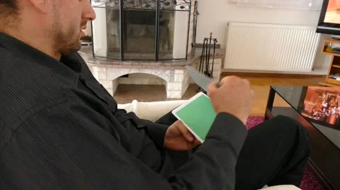 Male Model In Dark Jacket Looking At Ipad - Tablet Technology Internet Search Stock Footage 49184770